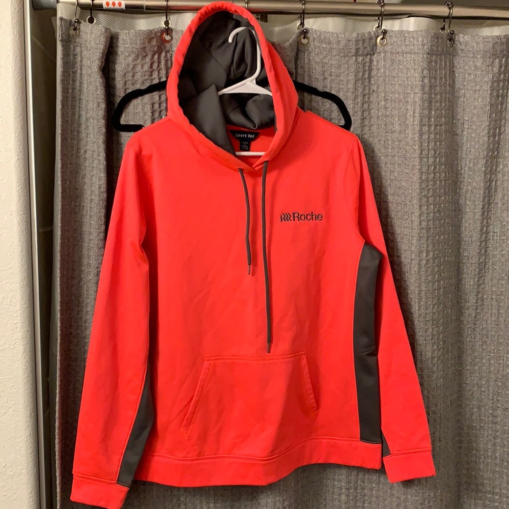 Roche HoTT neon pink sweater.
